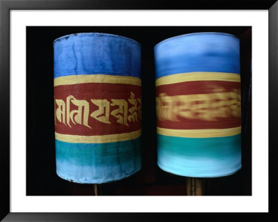 Prayer Wheels Spinning In Jambey Lhakhang, Bumthang, Bhutan by Richard I'anson Pricing Limited Edition Print image