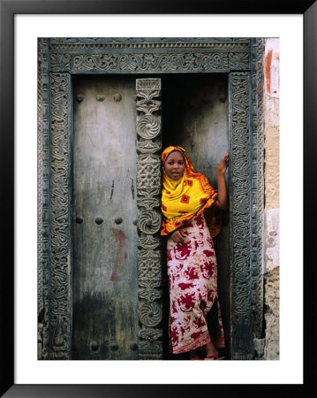 Swahili Girl In Zanzibar Doorway, Bagamoyo, Tanzania by Ariadne Van Zandbergen Pricing Limited Edition Print image