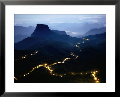 A Long Line Of Lights Illuminates The Path To Adam's Peak During The Poya Festival, Sri Lanka by Greg Elms Pricing Limited Edition Print image