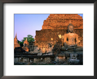Serene Buddha And Ancient Ruins At Wat Mahathat, Sukhothai Historical Park, Sukhothai, Thailand by Anders Blomqvist Pricing Limited Edition Print image