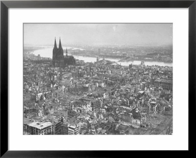 Aerial View Of Cologne Showing Devastation Of Allied Air Raids, Cathedral And Rhine River by John Florea Pricing Limited Edition Print image