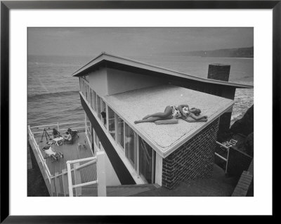 Guests Playing Cards And Sunbathing At Cliffside Home Of W. M. Macconnell by Peter Stackpole Pricing Limited Edition Print image