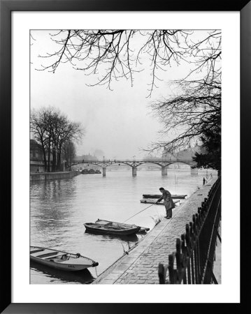 Rowboats Tied Up Along The Seine River by Ed Clark Pricing Limited Edition Print image