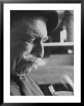 Wine Taster Sniffing Wine Before Tasting It by Carlo Bavagnoli Pricing Limited Edition Print image