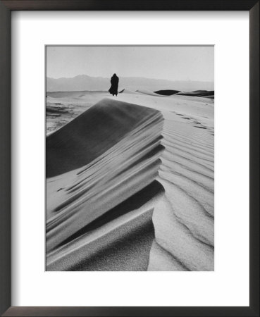 Man Wearing A Dog Skin Coat In The Gobi Desert by Howard Sochurek Pricing Limited Edition Print image