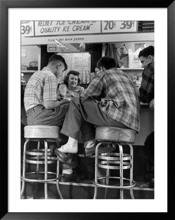 Young Men In Plaid Shirts Drinking Ice Cream Sodas At Soda Fountain by Nina Leen Pricing Limited Edition Print image