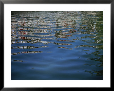 Ripples In Water Break Up A Reflection Into Hundreds Of Pieces by Jodi Cobb Pricing Limited Edition Print image