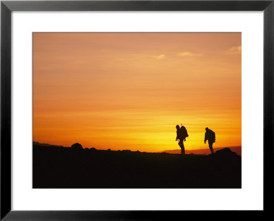 Silhouetted Climbers Ascend Nevado Ampato While The Sun Rises On The Horizon by Stephen Alvarez Pricing Limited Edition Print image