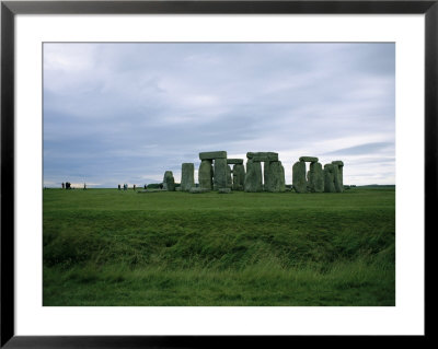 Gray Clouds Over The Ancient Ruins Of Stonehenge by Joel Sartore Pricing Limited Edition Print image