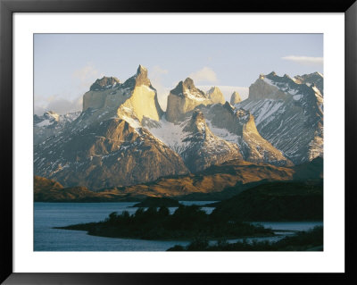 Snow Covers The Jagged Peaks That Rise Over The Valley by Skip Brown Pricing Limited Edition Print image