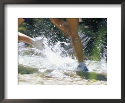 Runners Legs Splashing Through A Creek by Dugald Bremner Pricing Limited Edition Print image