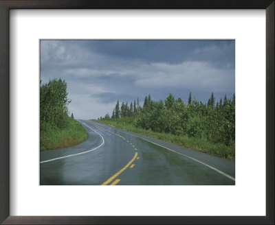 The Alaskan Highway Glistens From Rainfall Near Anchorage, Alaska by Stacy Gold Pricing Limited Edition Print image