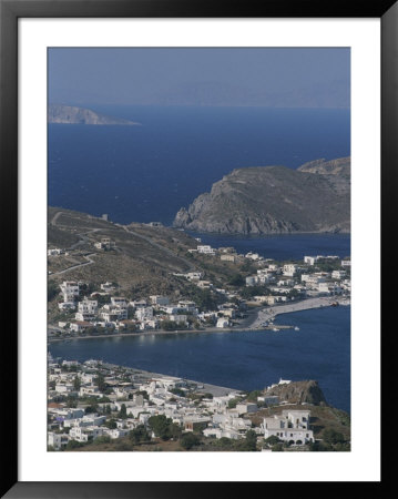 An Aerial View Of The Coastal Village Of Skala, On Patmos Island by Tino Soriano Pricing Limited Edition Print image