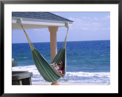 Woman Reading On A Hammock, Cayman by Barry Winiker Pricing Limited Edition Print image