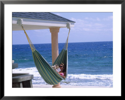 Woman Reading On A Hammock, Cayman by Barry Winiker Pricing Limited Edition Print image
