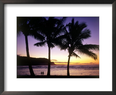 Silhouette Of Couple On Tropical Beach At Sunset by Rick Raymond Pricing Limited Edition Print image