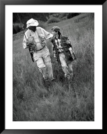 Grandfather And Boy In Field With Fishing Poles, Co by Bob Winsett Pricing Limited Edition Print image