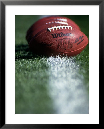 Footballs On Yard Line by Doug Mazell Pricing Limited Edition Print image