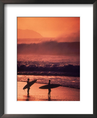 Surfers At Sunset, Oahu, Hawaii by Bill Romerhaus Pricing Limited Edition Print image