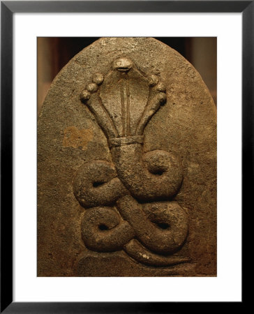 The Image Of A King Cobra Carved On The Surface Of A Stone by Mattias Klum Pricing Limited Edition Print image