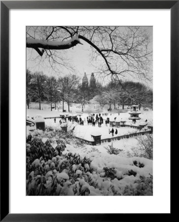 Snowing Evening Central Park, Nyc by Walter Bibikow Pricing Limited Edition Print image