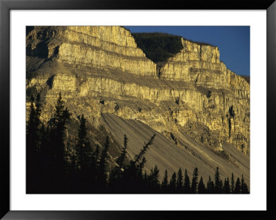 The Limestone Face Of A Mountain In The Nahanni Range by Raymond Gehman Pricing Limited Edition Print image