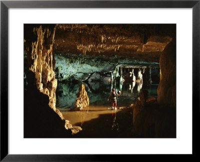 Spelunker Explores Mil Columnas Cave by Bill Hatcher Pricing Limited Edition Print image