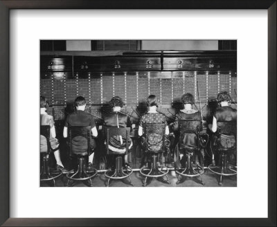 View Of Row Of Operators From Behind At Busy Switchboard At Telephone Company by Louis R. Bostwick Pricing Limited Edition Print image