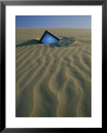 Computer Buried In Sand by Kevin Leigh Pricing Limited Edition Print image