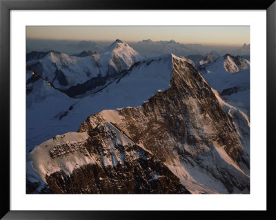 Sunset Light Glows On The North Face Of The Monch Mountain, Bernese Alps, Switzerland by Jodi Cobb Pricing Limited Edition Print image