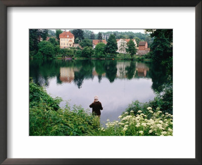Man Fishing In Lake In In Oliwa, Gdansk, Poland by Rick Gerharter Pricing Limited Edition Print image