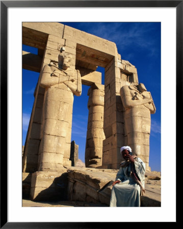 Man On Mobile Telephone At The Ramesseum, Luxor, Egypt by Juliet Coombe Pricing Limited Edition Print image