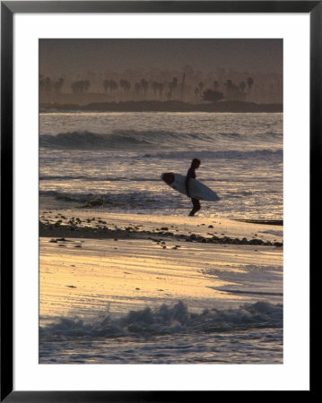 Surfer Silhouette At Ventura Point, California by Rich Reid Pricing Limited Edition Print image