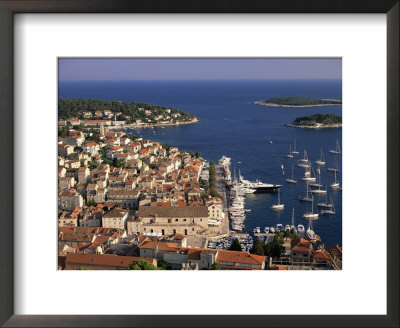 Elevated View Of The Town And Harbour, Hvar Town, Hvar Island, Dalmatia, Dalmatian Coast, Croatia by Gavin Hellier Pricing Limited Edition Print image