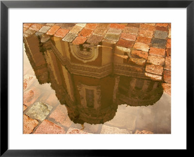 Reflection Of Alexander Nevsky Cathedral In Puddle Of Rainwater, Tallinn, Estonia by Nancy & Steve Ross Pricing Limited Edition Print image