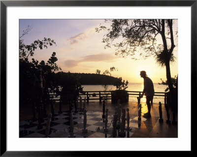 Playing Floor Chess At Sunset At Grand Lido Sans Souci Resort, Ocho Rios, Jamaica by Holger Leue Pricing Limited Edition Print image