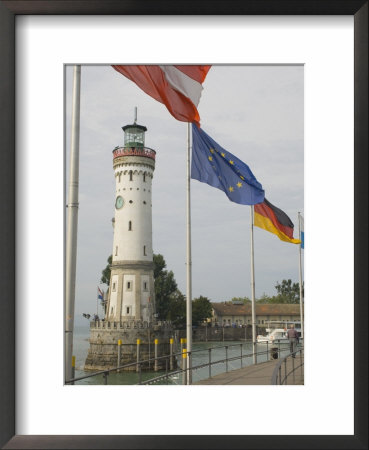 Harbour Lighthouse And Lion, Austrian German And Eu Flags, Lindau, Bavaria, Lake Constance, Germany by James Emmerson Pricing Limited Edition Print image