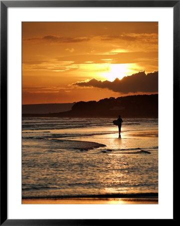 Surfer At Sunset, Devon, Uk by David Clapp Pricing Limited Edition Print image