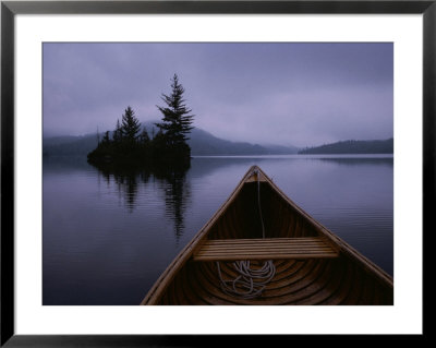 A Canoe Ride On A Cloudy Morning On A Quite Lake by Taylor S. Kennedy Pricing Limited Edition Print image