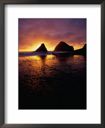 Sunset Over Coastal Rocks And Couple Walking On Beach, Devilas Elbow State Park, Usa by Mark & Audrey Gibson Pricing Limited Edition Print image