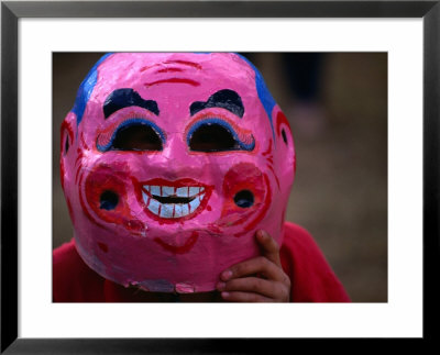 Boy Wearing Colourful Mask At Tet Nguyen Dan Celebrating Lunar New Year Holiday, Da Lat, Vietnam by Anders Blomqvist Pricing Limited Edition Print image