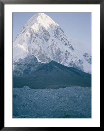 Mount Pumori Seen Behind The Darker Kala Pattar Mountain In The Foreground by Michael Klesius Pricing Limited Edition Print image