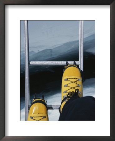 Dizzying View Of Crampons Traversing A Ladder In The Khumbu Icefall by Bobby Model Pricing Limited Edition Print image