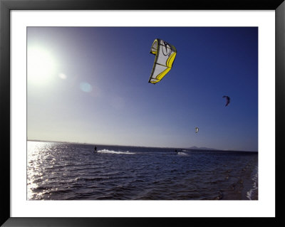 Three Kite Surfers On A Windy Summer Day Race Across A Bay, Australia by Jason Edwards Pricing Limited Edition Print image