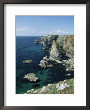 Elegug Stacks, Pembrokeshire, Wales, United Kingdom by Chris Nicholson Pricing Limited Edition Print image