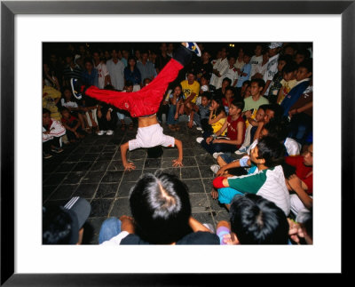 Youth Breakdancing With Crowd In Park On Dong Khoi Street, Ho Chi Minh City,  Vietnam by Stu Smucker Pricing Limited Edition Print image