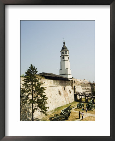 Clock Tower And Modern Military Cannon In The Grounds Of The Kalemegdan Citadel, Belgrade, Serbia by Christian Kober Pricing Limited Edition Print image