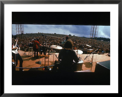 Huge Crowd Listening To A Band Onstage At The Woodstock Music And Art Festival by Bill Eppridge Pricing Limited Edition Print image
