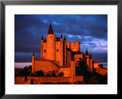 Alcazar From A Hillside At Sunset, With A Stormy Sky Looming Above, Segovia, Spain by David Tomlinson Pricing Limited Edition Print image