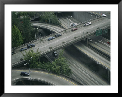 Aerial View Of Highways With Circling Overpasses by Todd Gipstein Pricing Limited Edition Print image